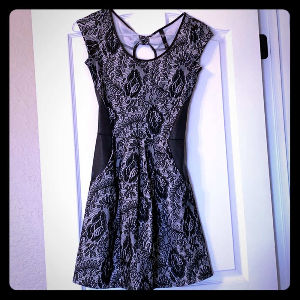 Lace & faux leather fit and flare with bow keyhole